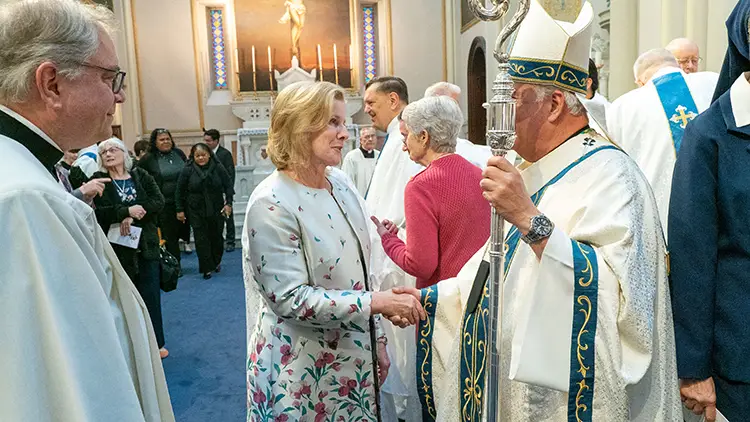 Archbishop Nelson Perez congratulates CAMM CEO Mary Jo Timlin-Hoag after the mass celebrating the Celebrate Mass of Thanksgiving for The Basilica Shrine of Our Lady of the Miraculous Medal.