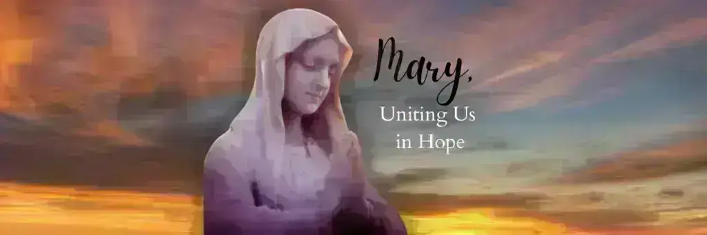 Statue of Mary with sunset background