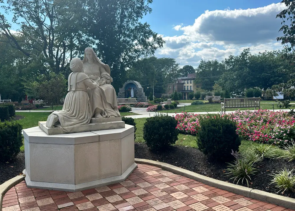 Rosary Walk Statue and Shrine in background